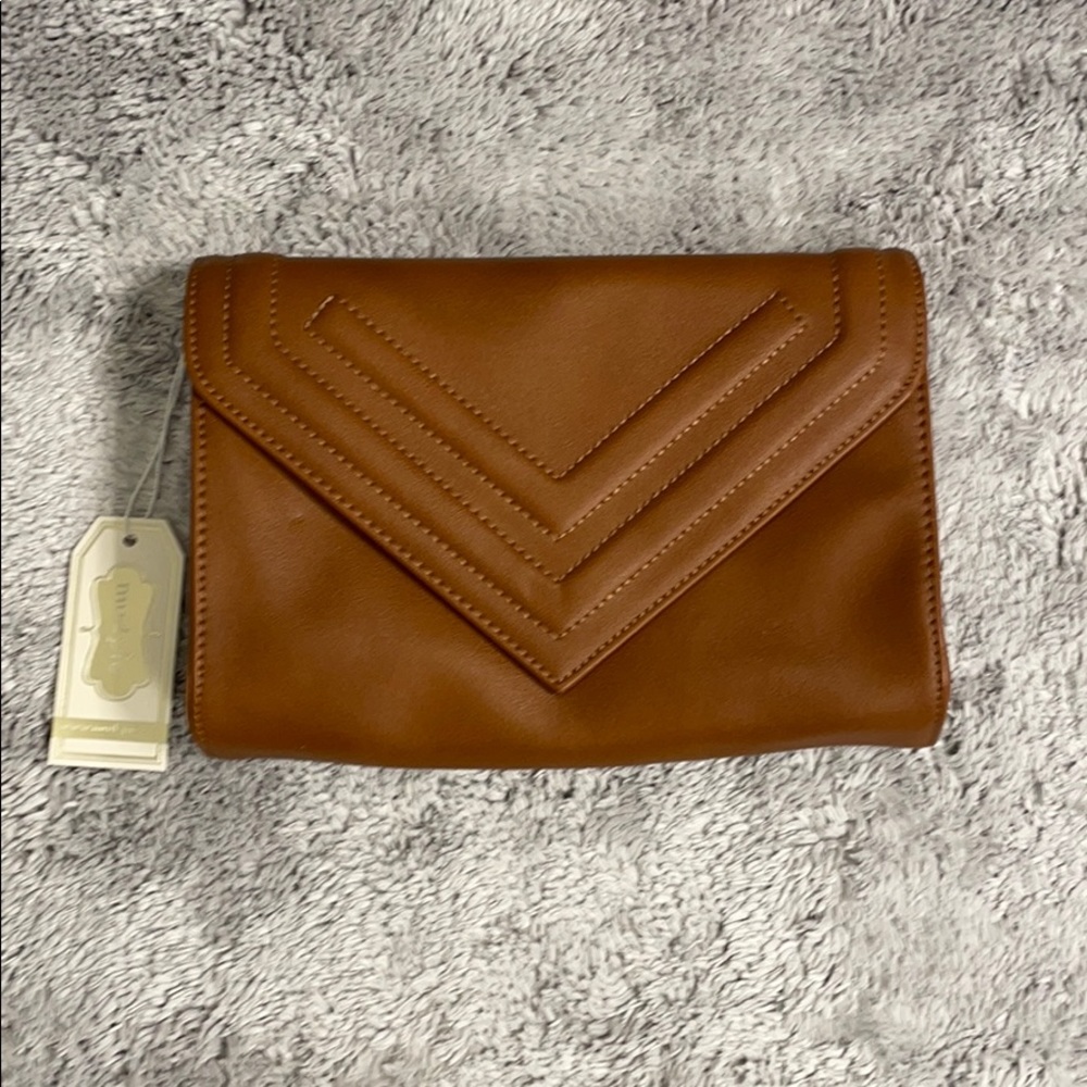 Mud Pie camel clutch